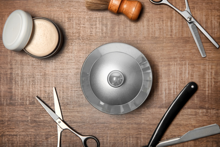 Professional hairdresser set for men on wooden tableの写真素材