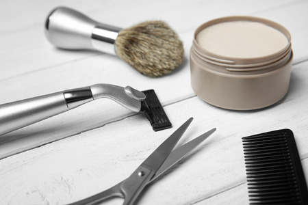 Professional hairdresser set for men on wooden tableの写真素材