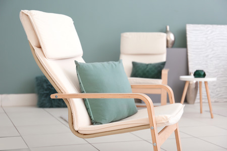 Comfortable armchair in modern living roomの写真素材