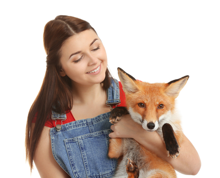 Woman with pet fox on white backgroundの写真素材
