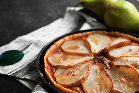 Delicious pear tart on tableの写真素材