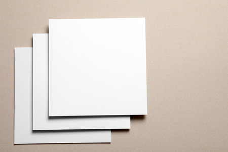 Blank sheets of paper on light background. Mock up for design