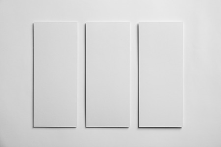 Blank sheets of paper on white background. Mock up for designの写真素材