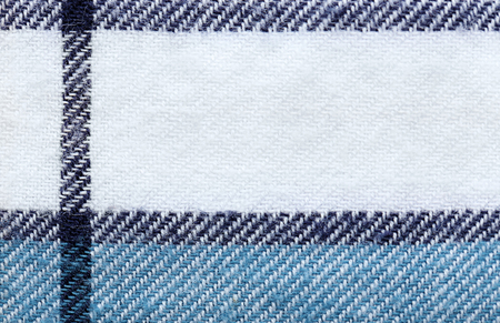 Plaid cotton fabric texture as background, closeup