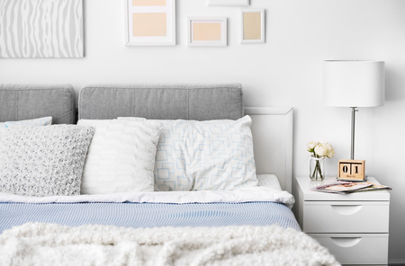 Modern room interior with comfortable bedの写真素材