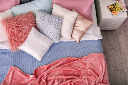 Comfortable bed with soft pillows, top viewの写真素材