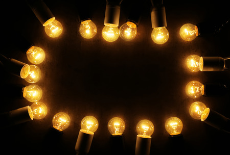 Festive christmas lights on dark backgroundの写真素材