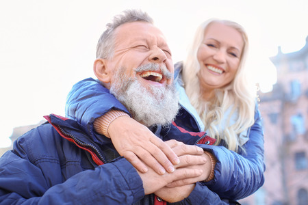 Happy mature couple outdoorsの写真素材