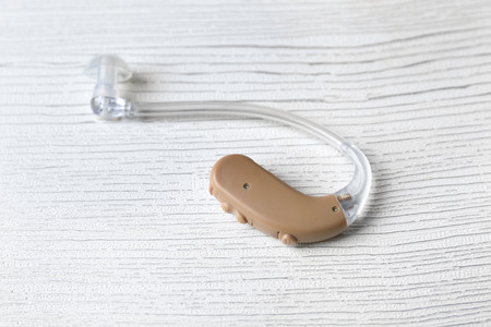 Hearing aid on light background