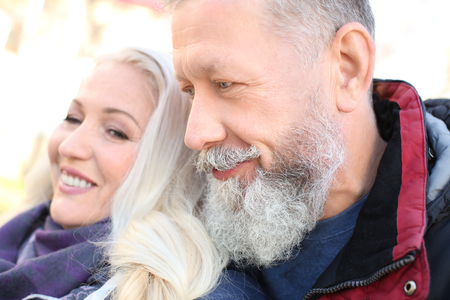 Happy mature couple outdoorsの写真素材