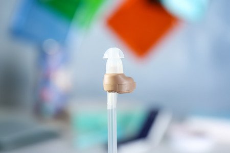 Hearing aid on blurred background