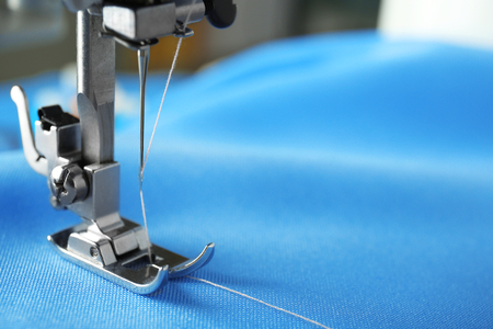 Sewing machine with fabric and thread, closeupの写真素材