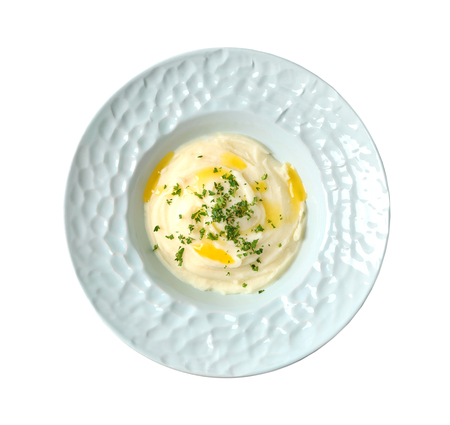 Plate with mashed potatoes on white backgroundの写真素材