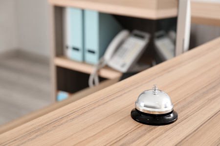 Service bell on reception desk in hotelの写真素材