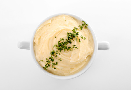 Dish with mashed potatoes on white backgroundの写真素材