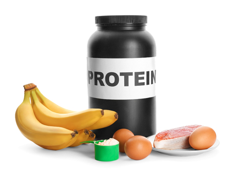 High protein food and powder on white backgroundの写真素材
