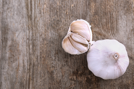Fresh garlic on wooden backgroundの写真素材