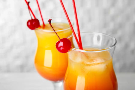 Glasses of Sex on the Beach cocktail against light background, closeupの写真素材