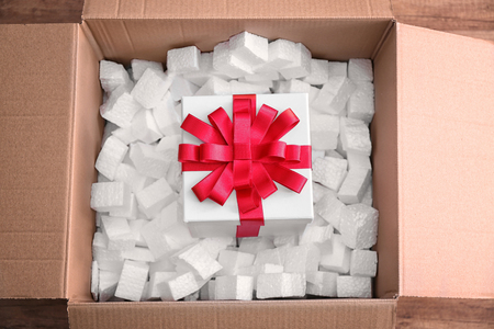Gift box in parcel, top view