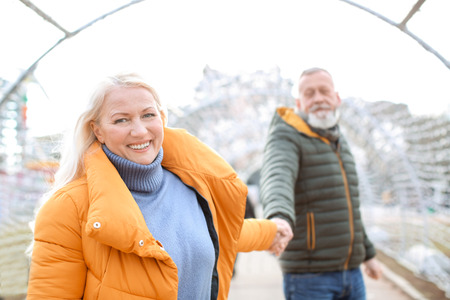 Happy mature couple outdoorsの写真素材