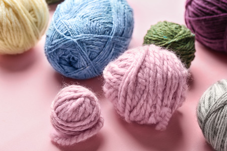 Knitting threads on color background