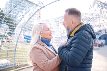Happy mature couple outdoorsの写真素材