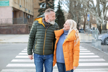 Happy mature couple outdoorsの写真素材