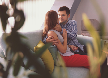 Young couple in love at homeの写真素材