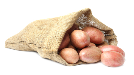 Sack of fresh raw potatoes on white backgroundの写真素材