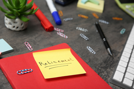 Sticky note with word "Pension" on notebook, closeupの写真素材