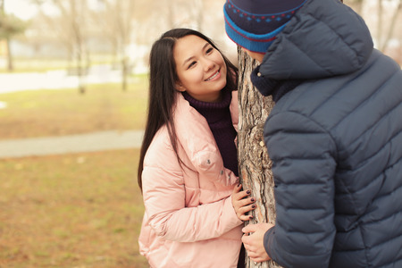 Cute couple in warm clothes outdoors