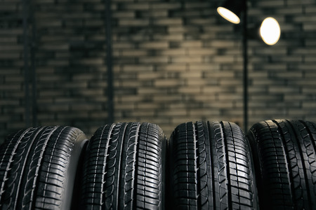 Car tires on blurred backgroundの写真素材