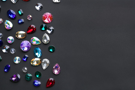 Colorful precious stones for jewellery on dark backgroundの写真素材