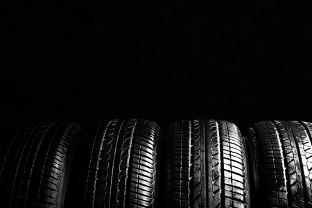Car tires on black backgroundの写真素材