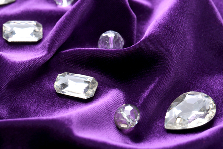 Precious stones for jewellery on purple velvetの写真素材