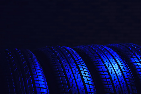 Car tires on black backgroundの写真素材