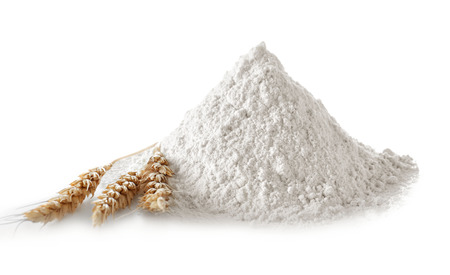 Heap of flour on white backgroundの写真素材