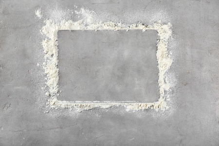 Rectangle frame made of flour on grey background, top viewの写真素材