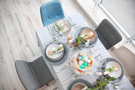 Beautiful Easter table setting with decorations