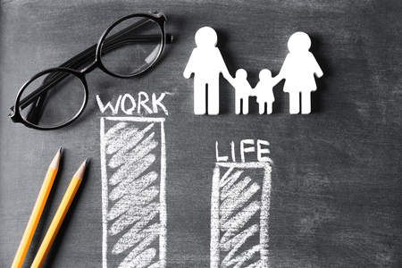 Bar chart with words WORK and LIFE on grey backgroundの写真素材