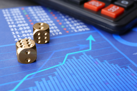 Dices on stock data graph. Finance trading conceptの写真素材