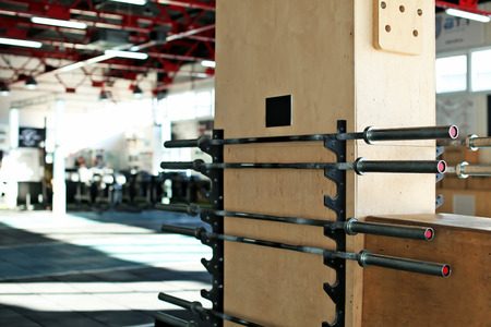 Stand with barbells in gymの写真素材