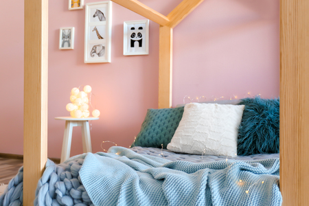 Children's room interior with comfortable bedの写真素材