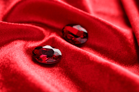 Precious stones for jewellery on red velvetの写真素材