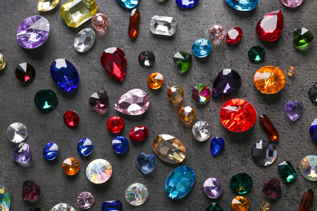 Colorful precious stones for jewellery on dark backgroundの写真素材