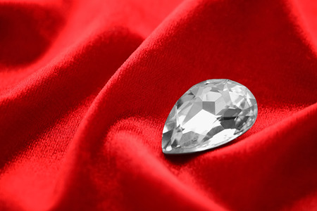 Precious stone for jewellery on red velvetの写真素材