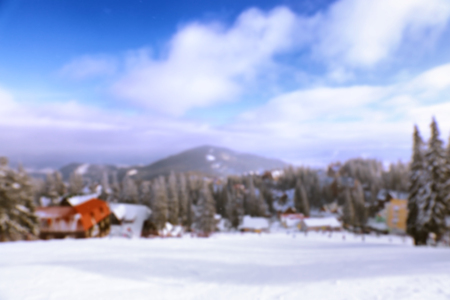 Beautiful ski resort on snowy day, blurred view. Winter vacationの写真素材