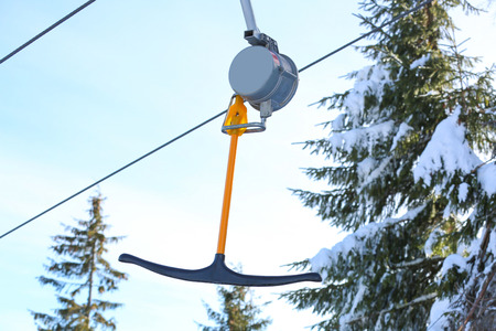 T-bar of ski lift at snowy resort. Winter vacationの写真素材