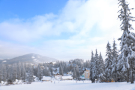 Beautiful ski resort on snowy day, blurred view. Winter vacationの写真素材