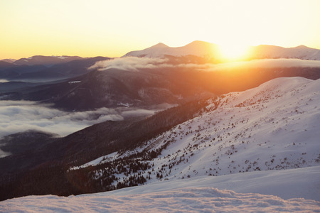 Beautiful landscape with snowy mountains in winter morning